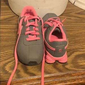 Pink and grey Nike Shox